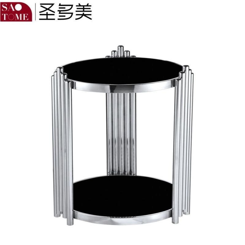 a Small Black Glass End Table That Can Be Placed Next to The Sofa