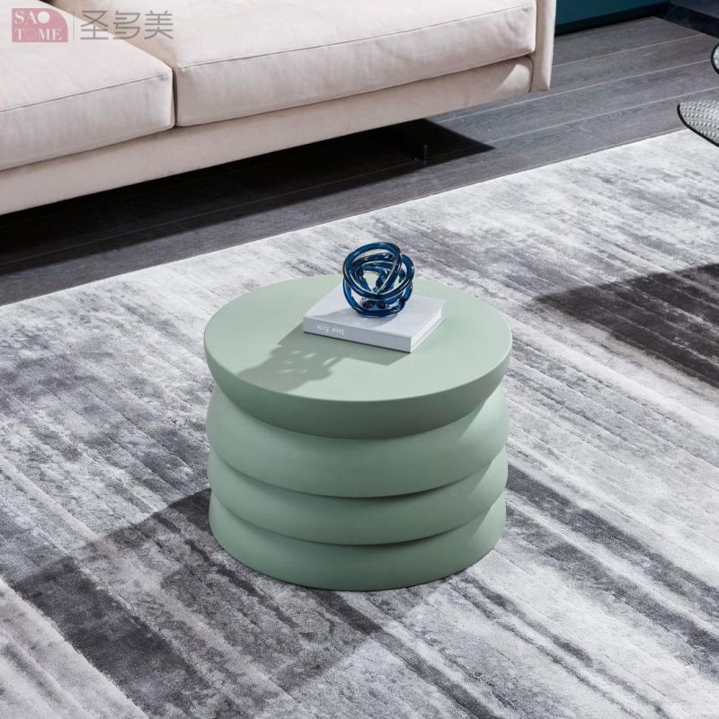 Small Round Table with Green Color Surface on Wooden Coffee Table